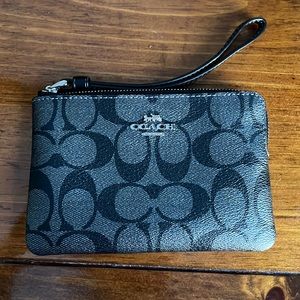 Small Black coach wristlet.